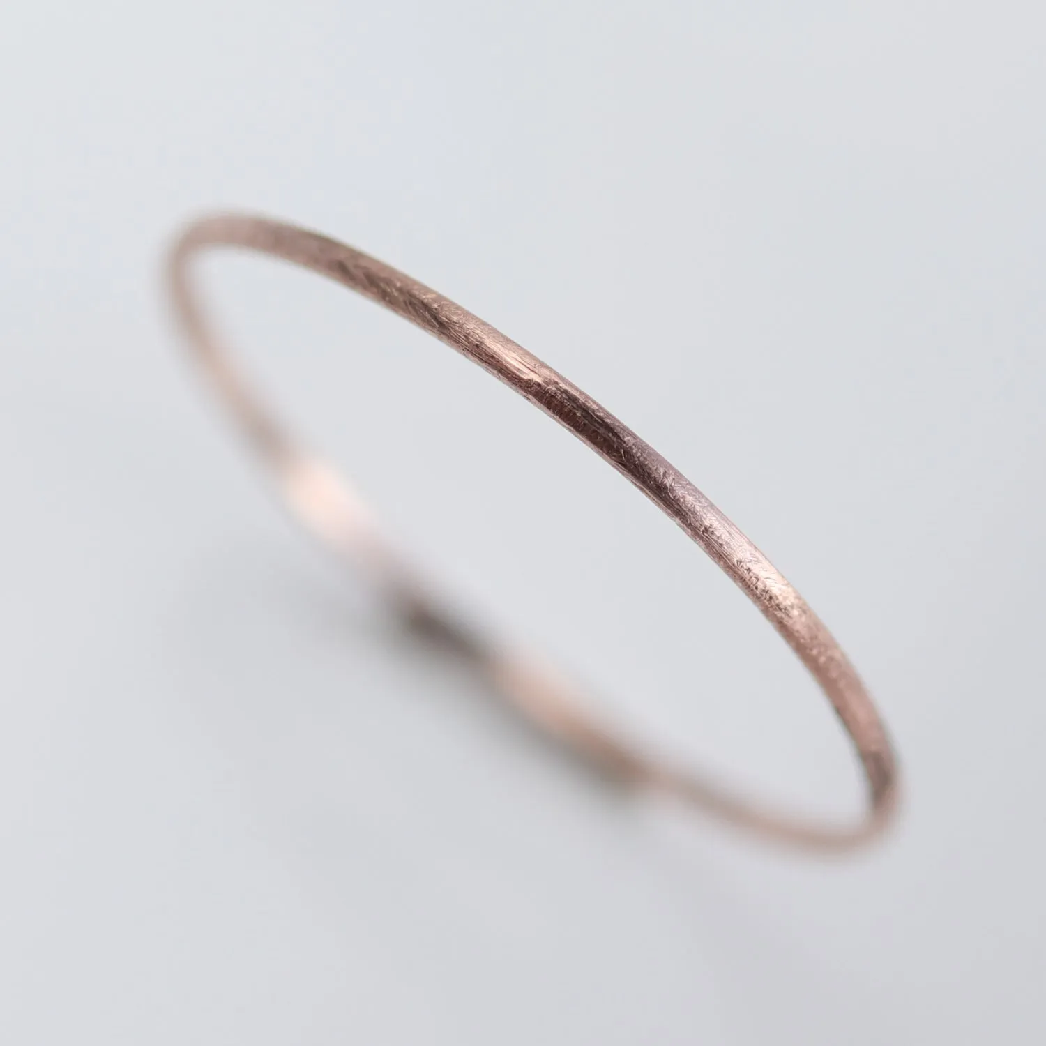 14k Rose Gold .8mm Rustic Round Ring