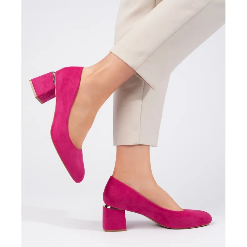 Fuchsia suede high-heeled pumps pink