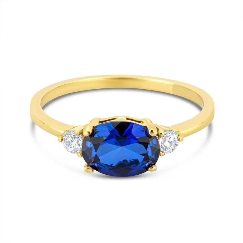 Latted Gold Ring Blue Dark 6x8 and 2 White Zircons