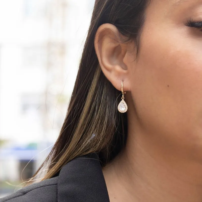 Yellow gold drop dangling earrings white zircons and blue zircon in the center